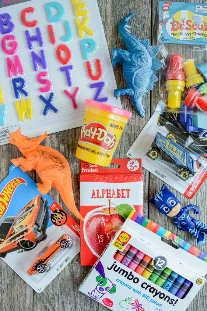 How To Make A Busy Box For Toddlers 3 Learn how to make a busy box for toddlers. These boxes are easy to customize and perfect for keeping toddlers occupied at a restaurant, on a plane, while mom is nursing and more!